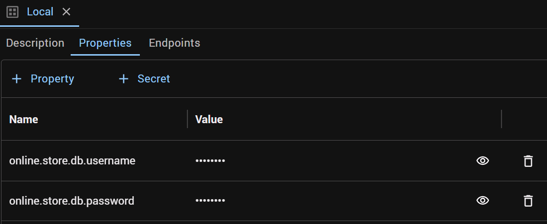 The Local environment's Properties tab, listing the online.store.db.username and online.store.db.password secrets with their values masked